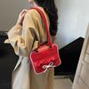 Korean niche design handbag women's 2025 new fashion bow small square bag commuter shoulder armpit bag