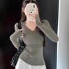This Is A New Autumn Casual Style, Slimming and Versatile Design with A Pit Pattern V-neck Long-sleeved Knitted Sweater for Women