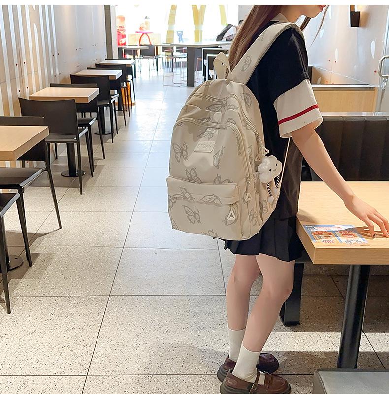 Рюкзак с принтом бабочек на два плеча для студентов, модель 2025 года - нишевый дизайн для девочек среднего, старшего школьного и студенческого возраста.