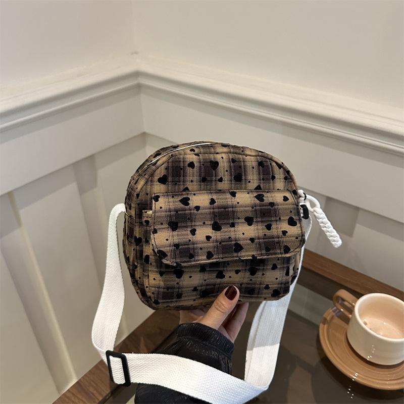 Niche design plaid bag women's 2025 autumn new trendy shoulder messenger bag feeling versatile commuter saddle bag