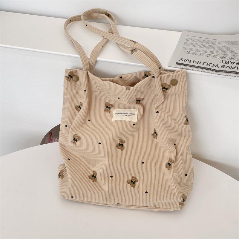 Copyright model, corduroy cartoon printed bear large-capacity portable shoulder bag, student armpit bag for class