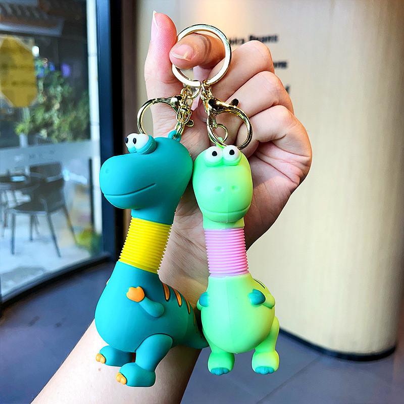 Очаровательный выдвижной брелок-динозавр, милый мультяшный дизайн для детей и взрослых