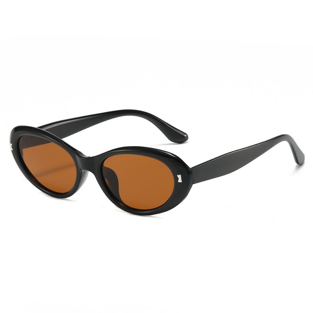 Simple oval cat eye white frame sunglasses women's trendy high-end street shooting seaside UV protection sunglasses