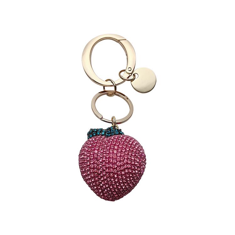 Персиковый брелок-коготь со стразами с большой хрустальной пряжкой