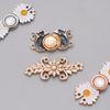 Removable, no-sew, no-nail waist button for jeans. Daisy waist button for slimming jeans.