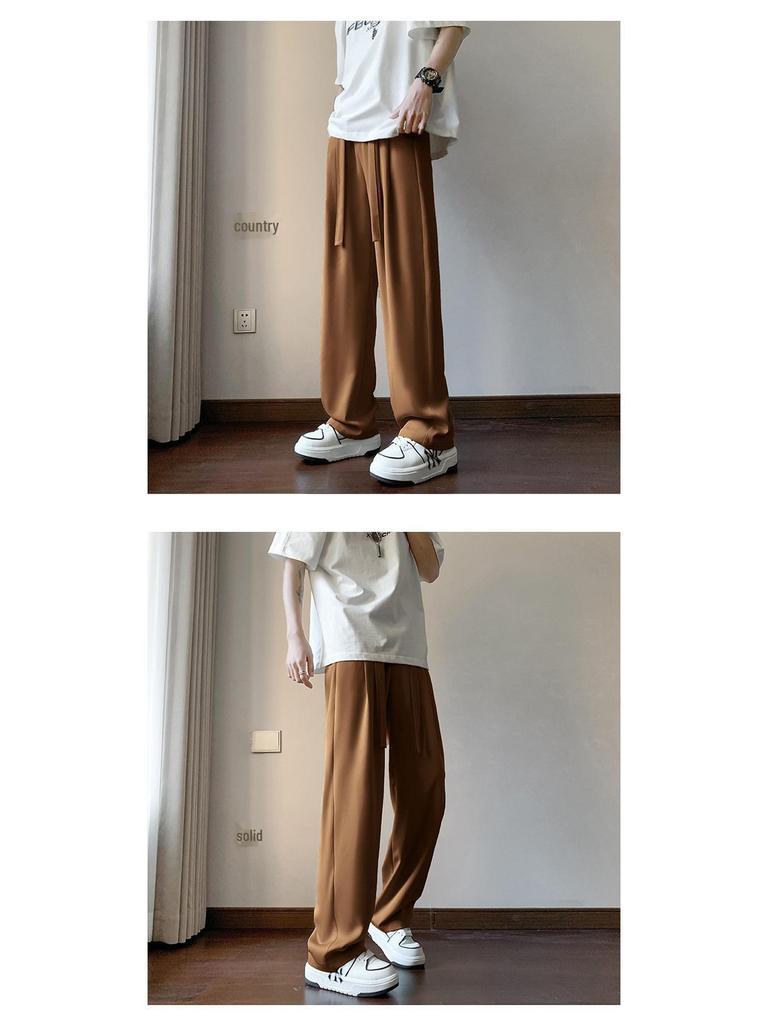 Брюки из итальянского драпированного ледяного шелка в стиле британских яппи с завязками