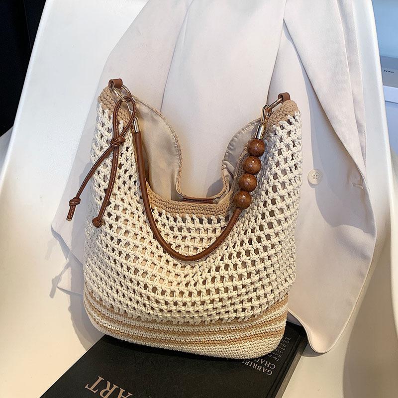 Женская сумка-тоут 2025 новая большой вместимости для поездок на работу для студентов колледжа на занятия плетеная мягкая полая пляжная на плечо