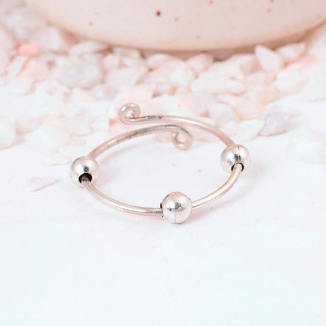 Adjustable Silver Fidget Ring: Anxiety Relief Spinner Jewelry with Three Small, Movable Beads and an Open Wire Wrap Design.