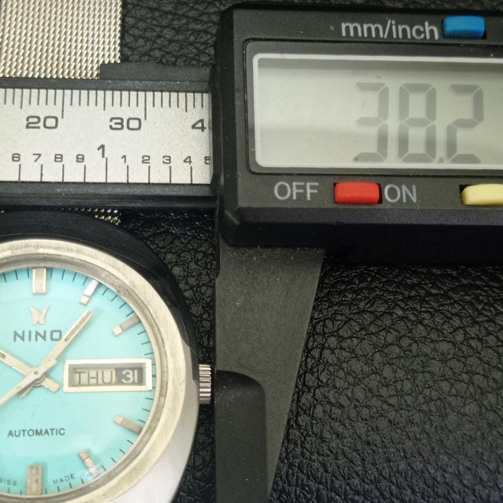 ВИНТАЖНЫЕ NINO АВТОМАТИЧЕСКИЕ 2066 ШВЕЙЦАРСКИЕ МУЖСКИЕ ЧАСЫ ЦВЕТА МОРСКОЙ ВОЛНЫ a703032-1