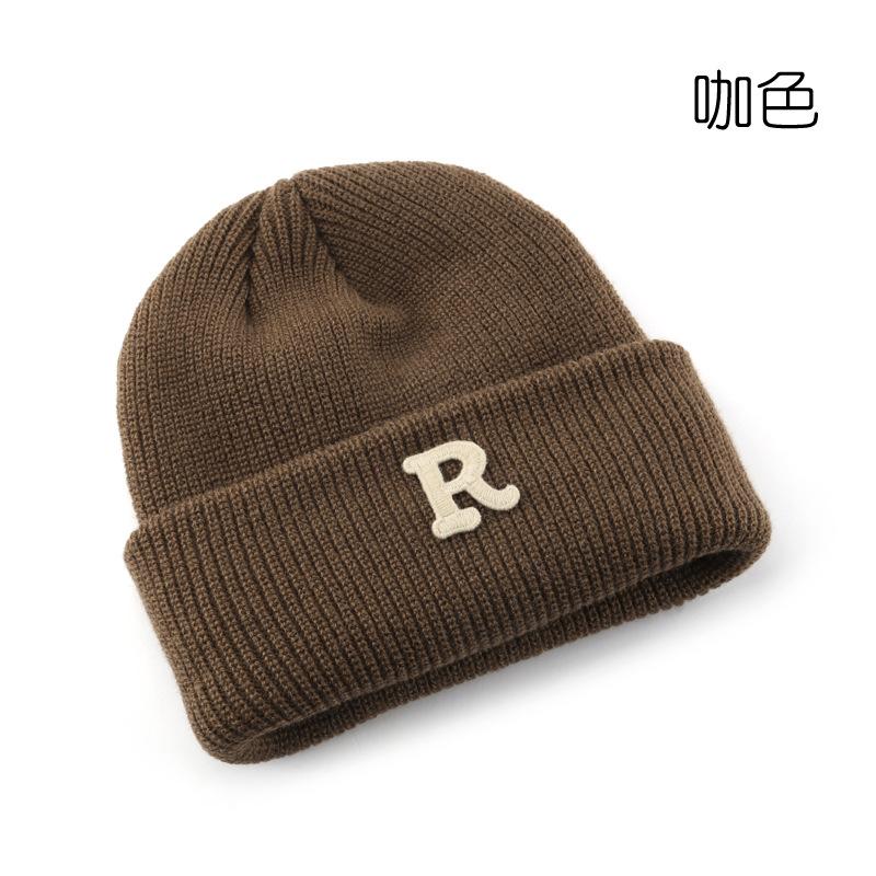 Women's Solid Color Letter Print R Rolled brim knitted hat for outdoor cycling, providing warmth, cold protection, and ear coverage