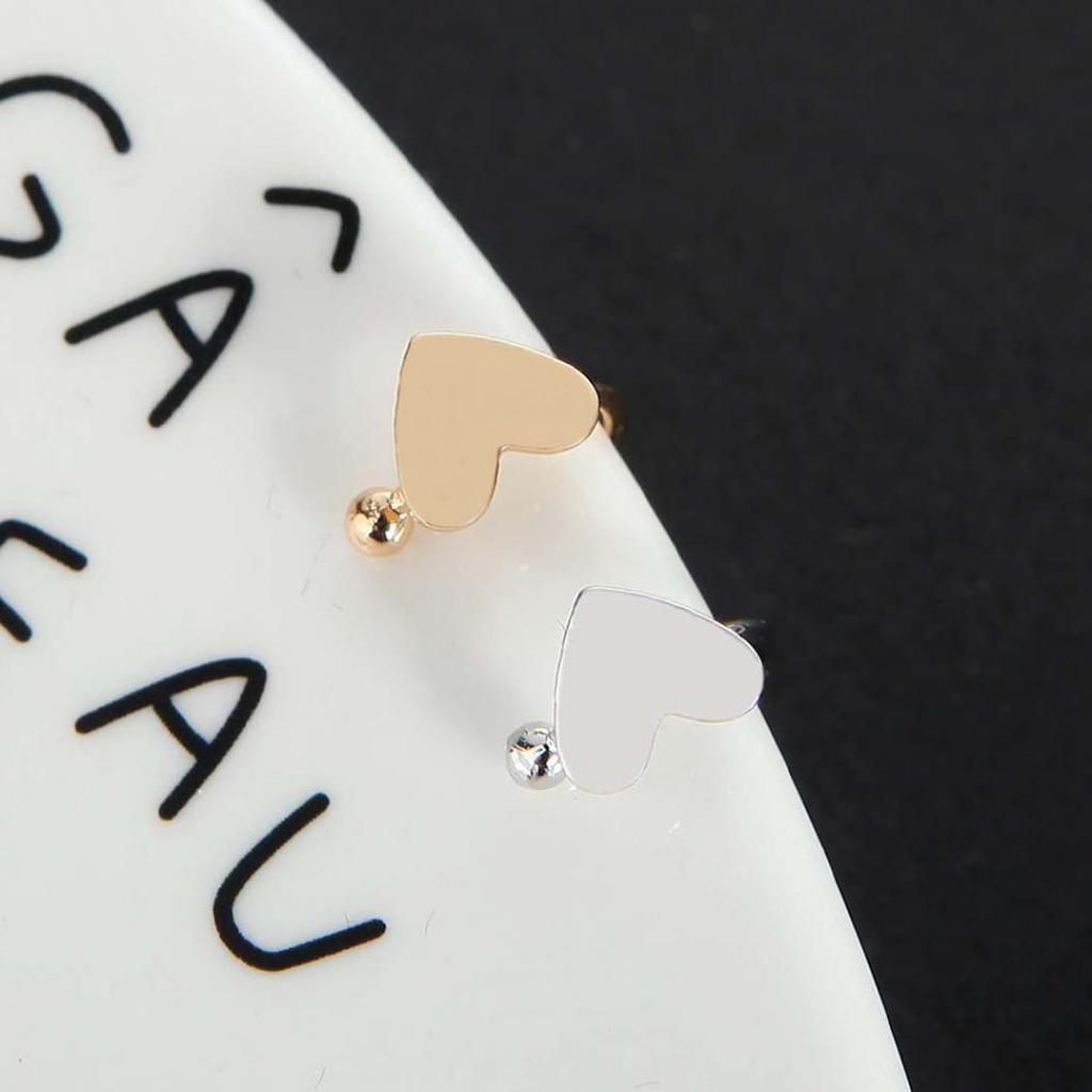 Клипса на ухо в виде полукольца с треугольником, сердечком или звездой