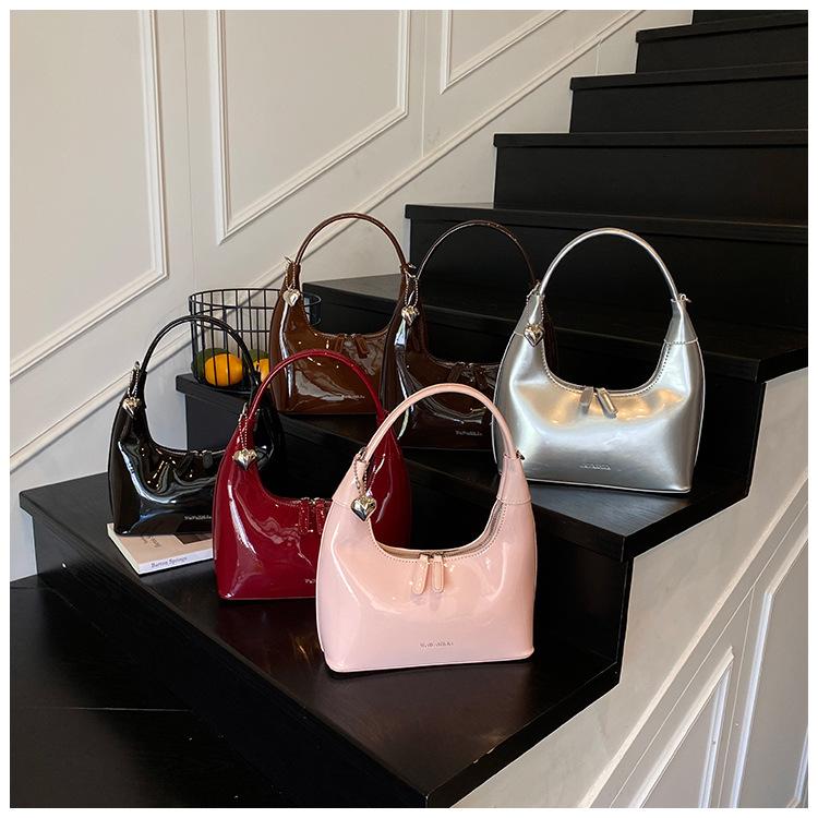 Сумка премиум-класса нишевая женская лето 2025 новая модная на плечо, сумка-мессенджер, корейская версия, глянцевая портативная сумка-пельмень