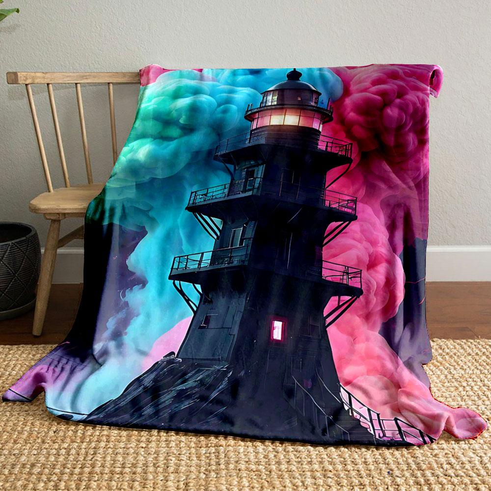A black lighthouse stands amid vibrant pink and teal swirling clouds. for all seasons blanket lunch break throw gift