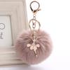 Высококачественный брелок для ключей для женщин, сумка, танцующий ангел, пушистый помпон, брелок, популярный балерина, девушка, брелки, ювелирные изделия, подвеска для автомобиля, аксессуары