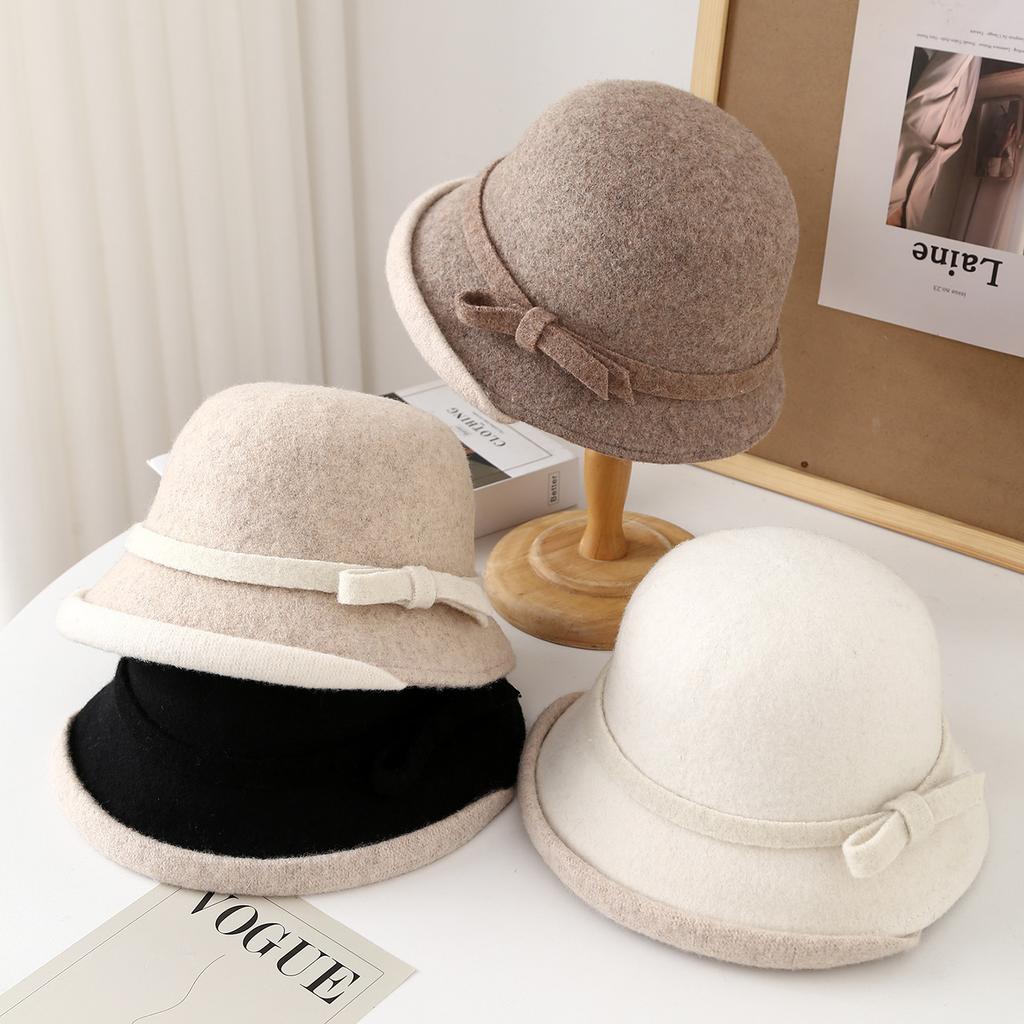 Autumn and winter new wool temperament bow top hat women's fashion thermal basin hat elegant temperament curling bucket hat