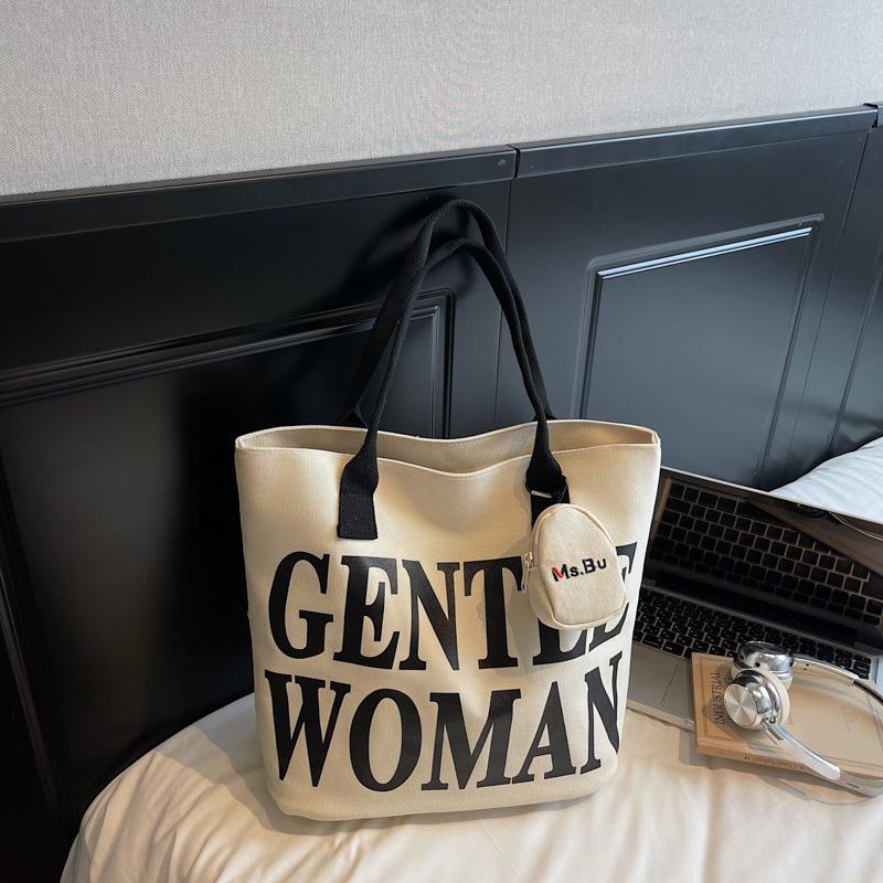 2025 осень новая мода простая повседневная большая вместимость на плечо сумка-тоут из холста с алфавитом корейская версия
