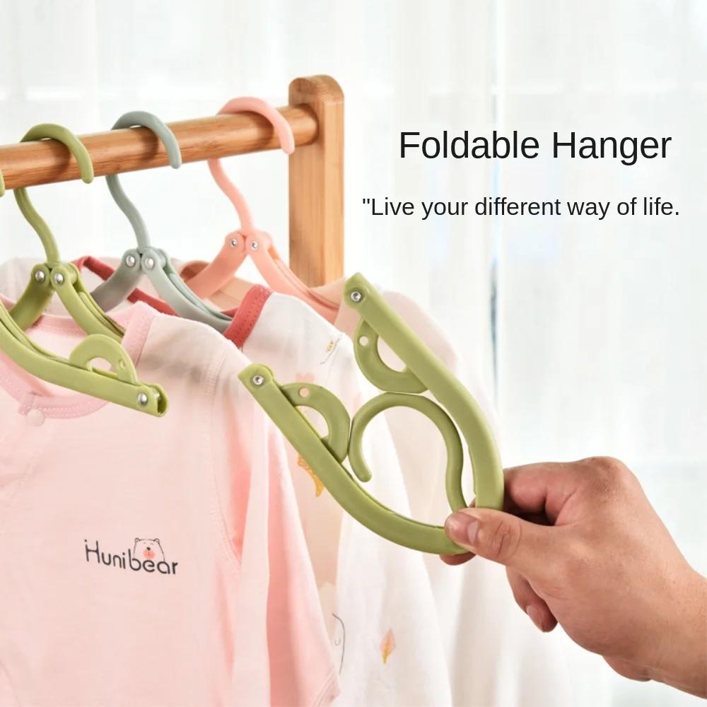 Новая дорожная портативная пластиковая вешалка Многофункциональная простая складная вешалка для дома Противоскользящая сушильная поддержка