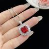 Стильный комплект украшений: открытое кольцо с красным турмалином и серьги с цирконами для женщин