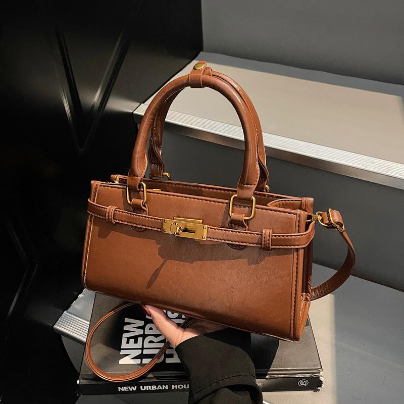 Корейская версия простой и универсальной нишевой портативной сумки-мессенджера для поездок на работу, женская, новая коллекция осень-зима 2025, высококачественная текстурированная сумка-тоут