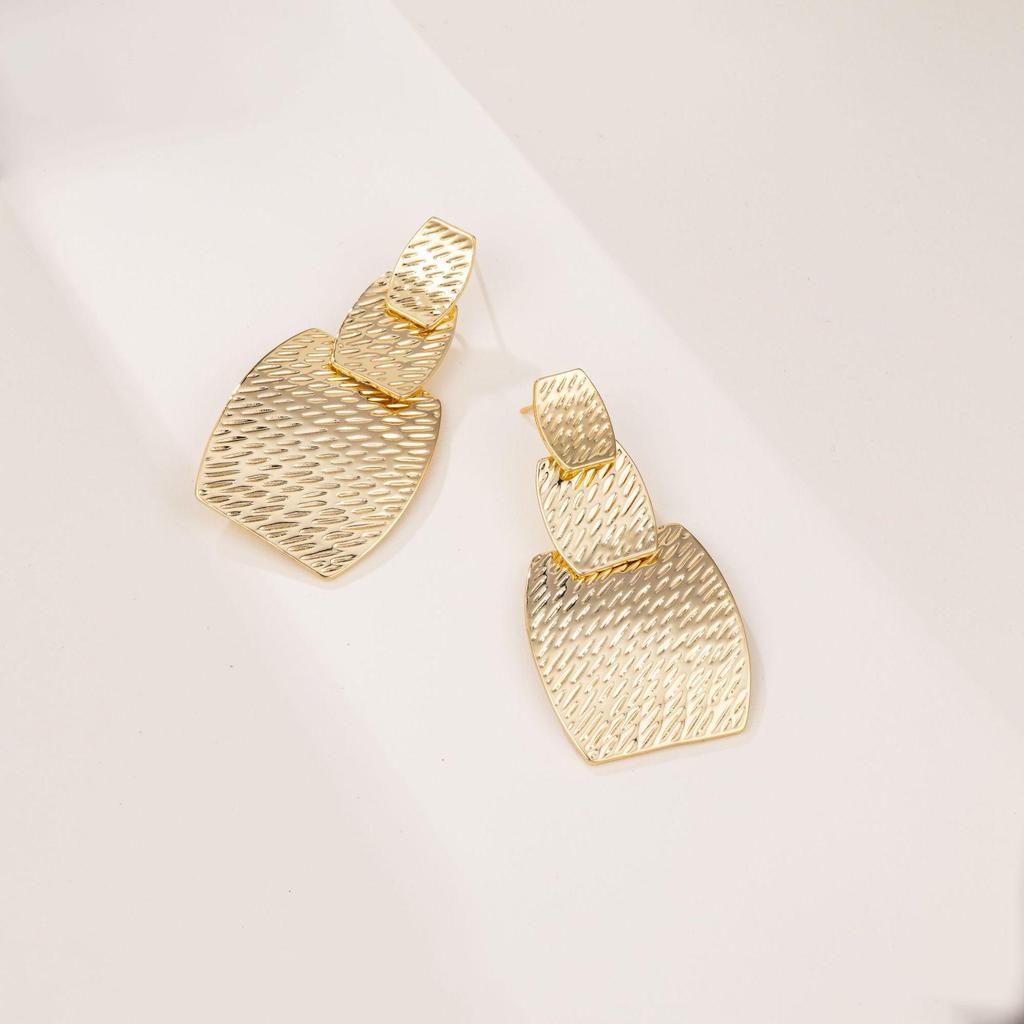 "Modern European & American Gold-Plated Statement Earrings - High-End Niche Design"