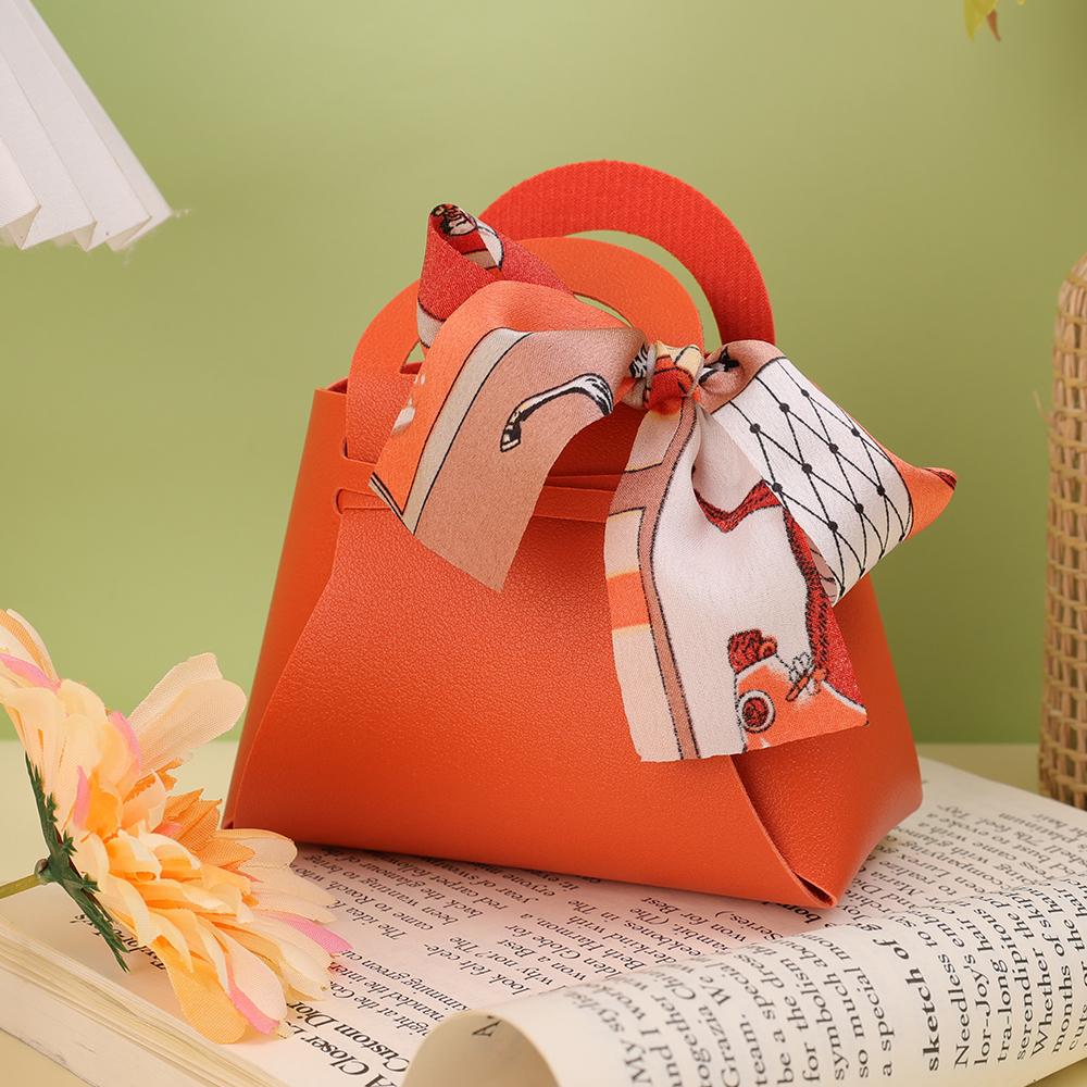 Роскошная кожаная мини-сумочка с бантом и лентой Подарочные пакеты Упаковочная коробка для конфет Распределительная сумка Свадебная вечеринка Подарочная коробка для конфет Кошелек