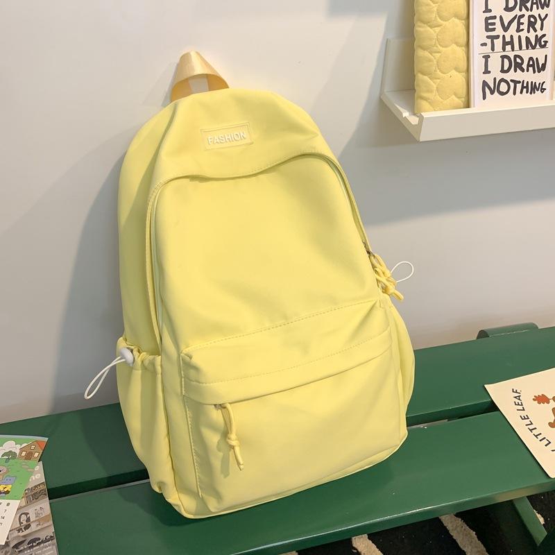 The Schoolbag Is Fresh and Sweet, and the Solid Color Is Versatile and Simple. The Schoolbag for Junior High School Students Is Light