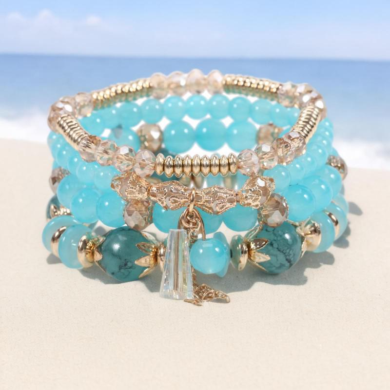 Шикарный женский браслет в стиле бохо с четырьмя слоями стеклянных бусин и кисточками