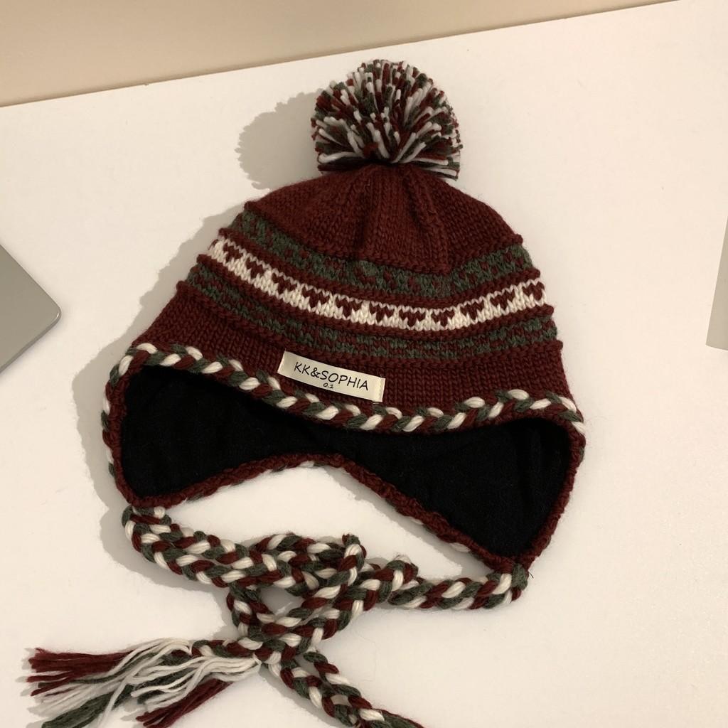 Knitted Chic Cozy Winter Hat For Women Featuring Colorful Pom Poms Warmth And