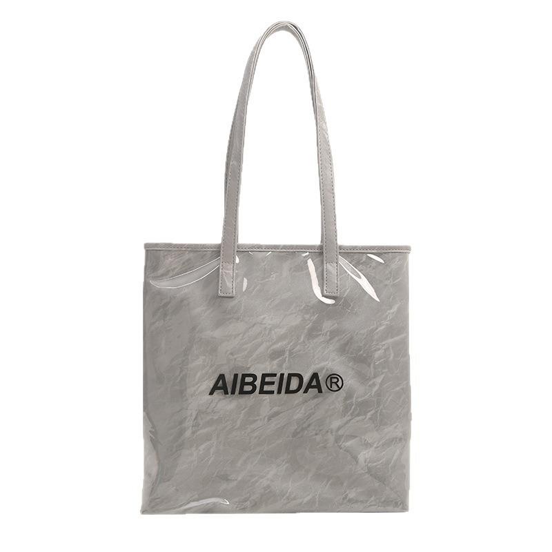 Прозрачная сумка-желе, прочная женская сумка C, новая трендовая сумка под мышку через плечо большой вместимости, простая портативная сумка-тоут.