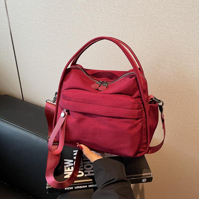 Japanese Casual Versatile Nylon Cloth Small Bag 2025 New Fashion Portable Shoulder Bag Commuter Messenger Bag