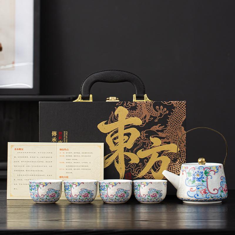 Oriental Guochao gold and silver wrong black pottery lifting beam pot tea set gift box gift tea pot one pot four cups lo