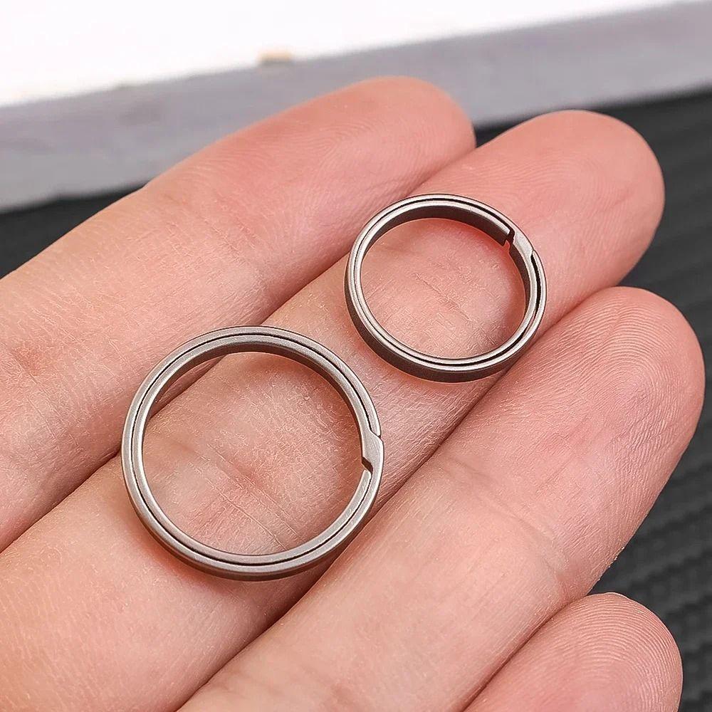 4pcs Metal Key Chain Pendant Hard Side Pushing Rings Creative Titanium Alloy Key Ring Outdoor Tools