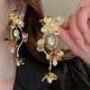 Серьги-кисточки из позолоченного серебра с полыми иглами и цветами - европейский и американский нишевый дизайн
