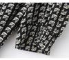 Waist cinching temperament long sleeved mid length skirt