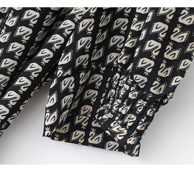 Waist cinching temperament long sleeved mid length skirt