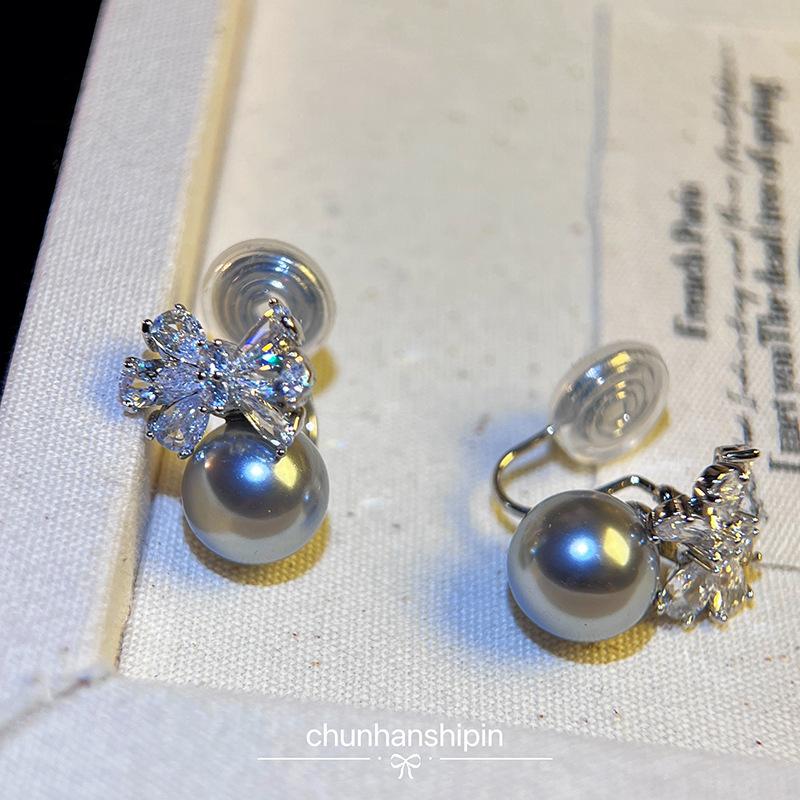 Zircon bow temperament pearl no earrings earrings women's niche design earclips mosquito coil disc high-end earrings