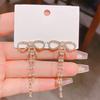 S911 silver needle charm zircon bow long fringed stud earrings women's light luxury niche super fairy temperament earrings