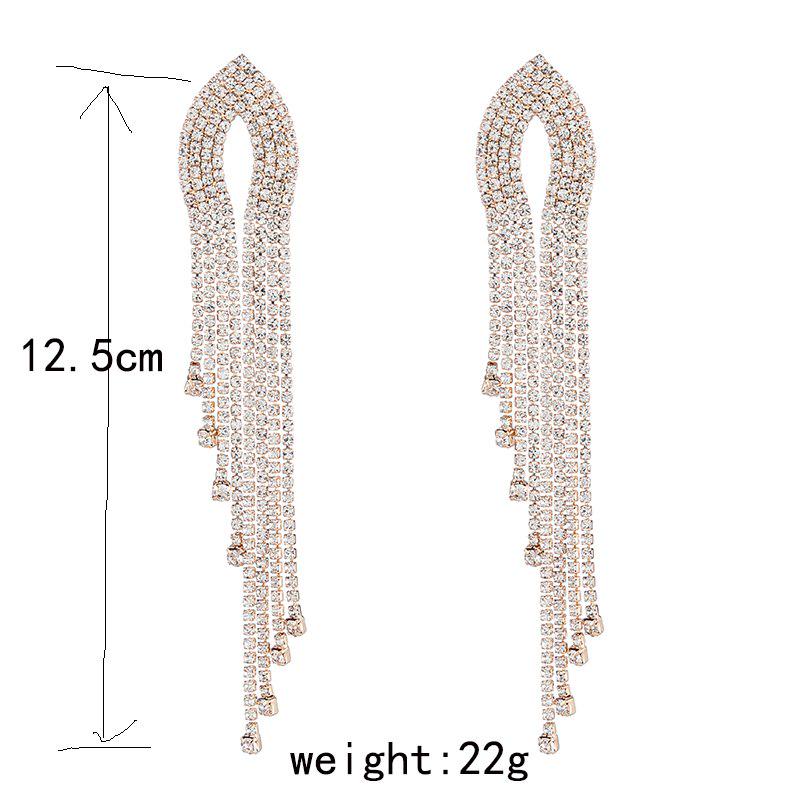 Длинные роскошные серьги гвоздики инкрустированные кристаллами