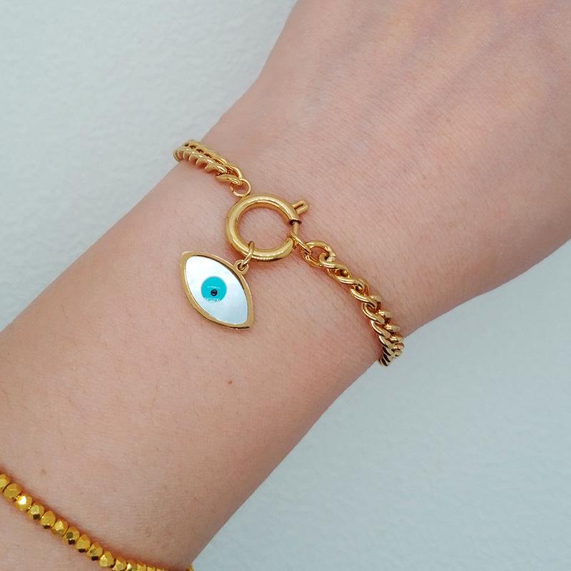 Титан, титановая сталь, белая ракушка, кулон с голубыми глазами, золотой браслет из нержавеющей стали