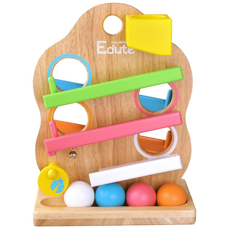 TREE Slope Slope A slope toy where a ball encouraging concentration and visual A soothing wooden sound that stimulates improves tracking and promotes