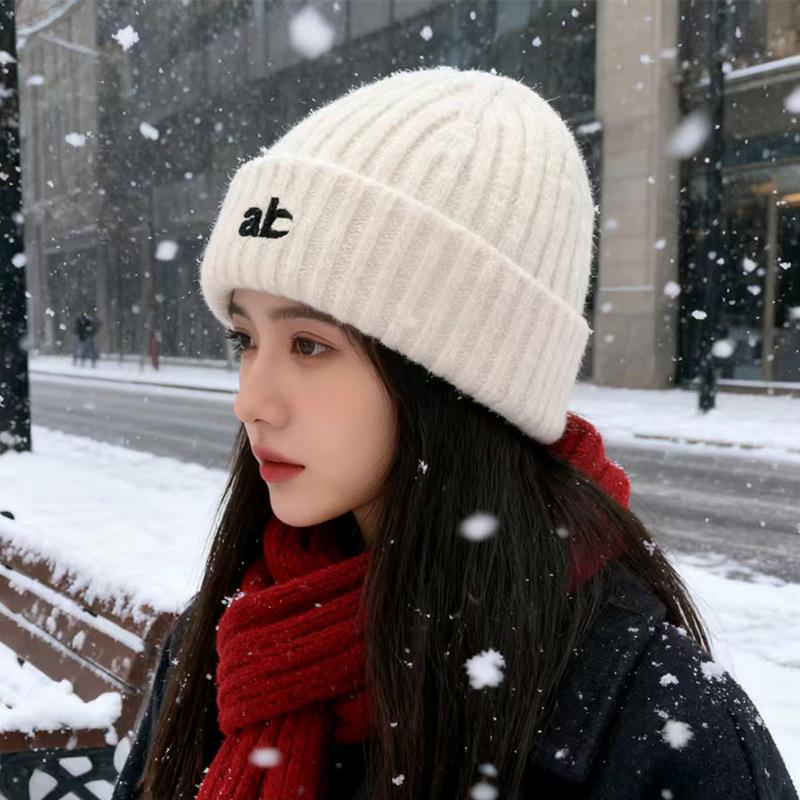 Autumn and winter warm versatile knitted hat fashionable cold protection ear protection wool hat