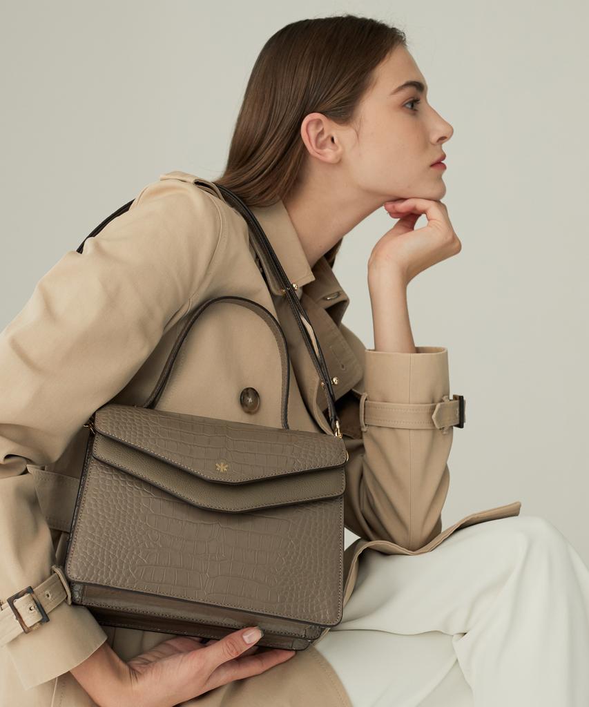 Kenneth Young Irma Taupe Croco