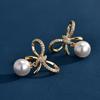 Серьги-пусеты с бантом и жемчугом в стиле легкой роскоши, весенний дизайн, нишевые серьги, темпераментные, универсальные, изысканные серьги