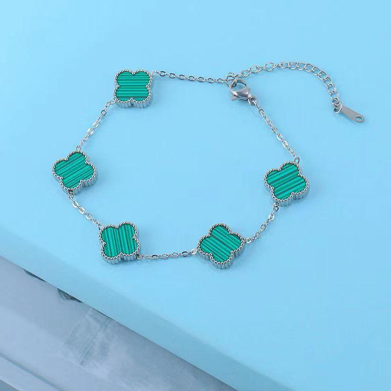 Браслет с четырьмя листами клевера с двухсторонним титановым сплавом, который не выцветает, и пятью цветочными мотивами, простой и универсальный браслет