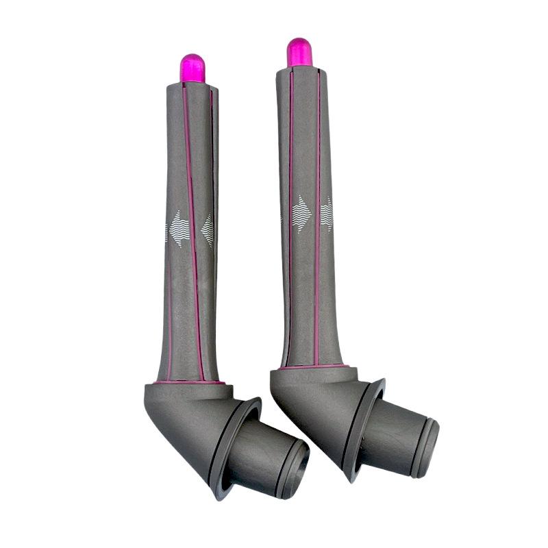 Аксессуары для щипцов для завивки Dyson: Трубка для завивки, насадка для ветра, диффузор для предварительной укладки, расческа и инструмент для укладки.