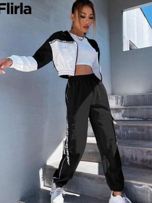 Женский спортивный топ с цветными блоками и комплект очень длинных брюк