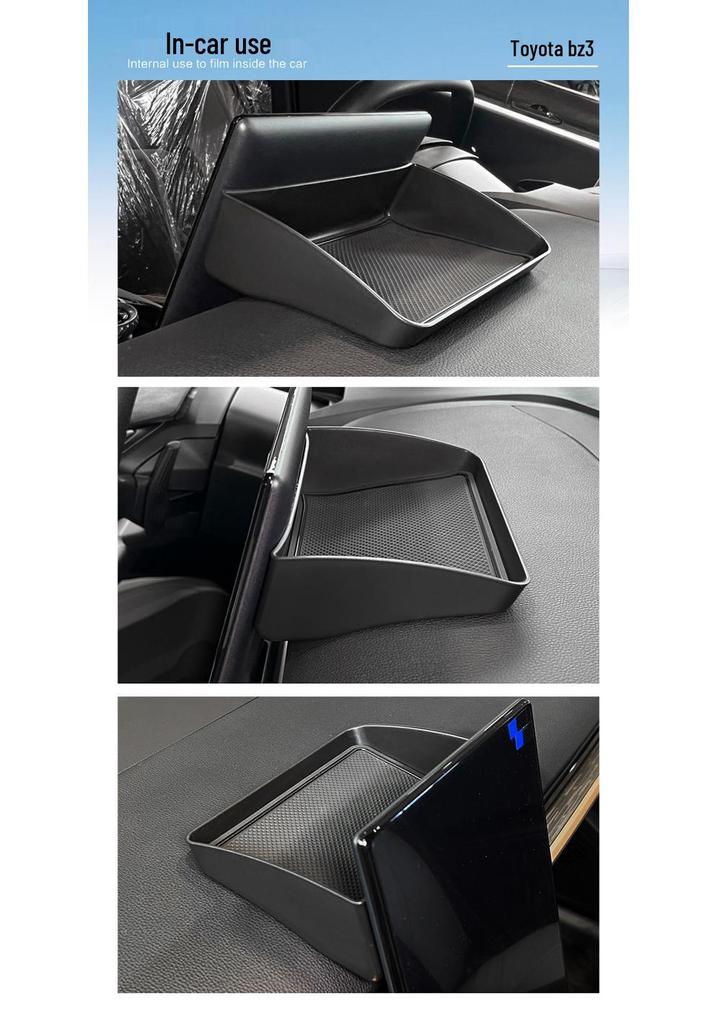 Toyota BZ3 Dashboard Organizer: Center Console, Screen, Rear Storage, and Tissue Holder.