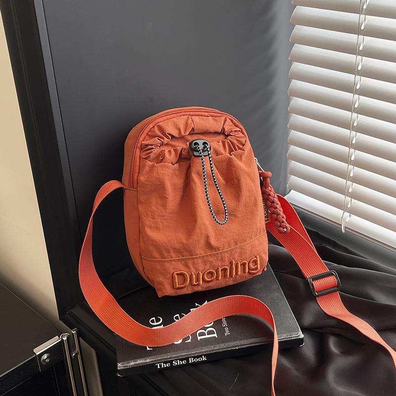 2025 Summer New Japanese Trend Sports Drawstring Mobile Phone Bag Light Commute Outdoor Leisure Messenger Women's Bag