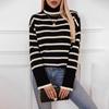 Женский вязаный свитер-пуловер на осень и зиму с контрастными полосками и свободными разрезами. Водолазки