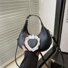 Handheld chain bag women 2025 new spring and summer niche dumpling bag versatile simple shoulder messenger bag